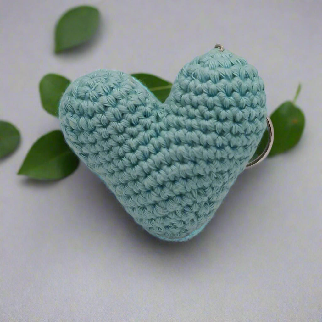 Crocheted heart-shaped light blue keychain