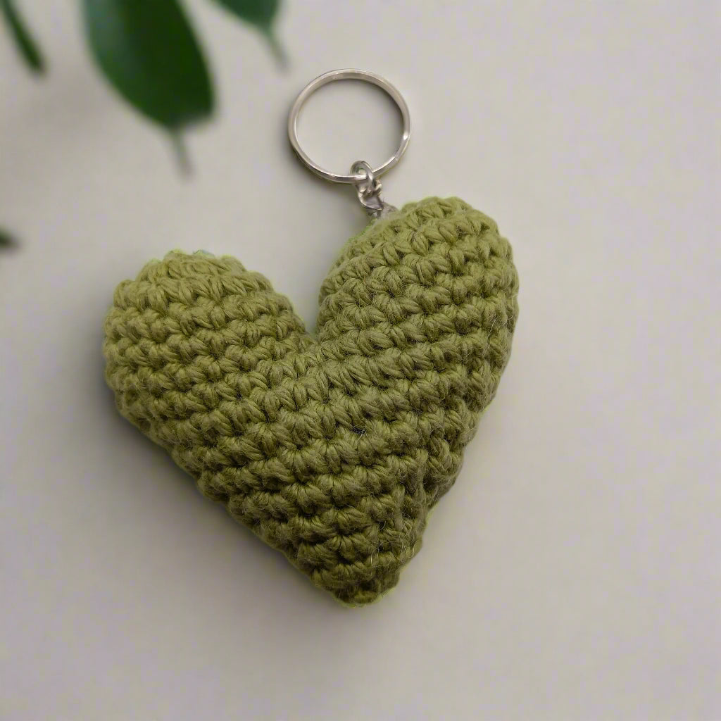 Green crocheted heart-shaped keychain