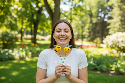 Two crochet bee toys with green stem