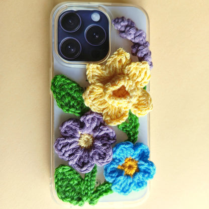 iPhone 15 pro case with crocheted flowers 